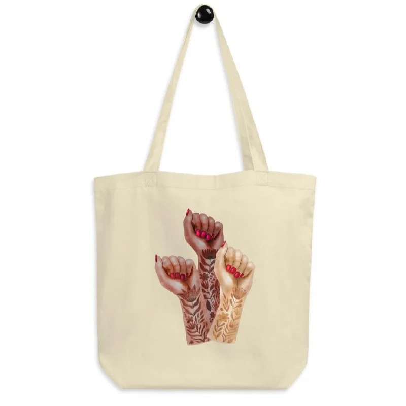 Urban T-ShirtsRaised Feminist Watercolor Tattoo Fists -- Tote Bag